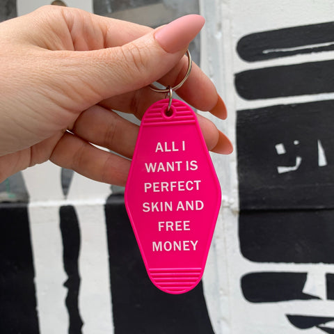 All I Want is Perfect Skin and Free Money Motel Style Keychain in Fuchsia Pink