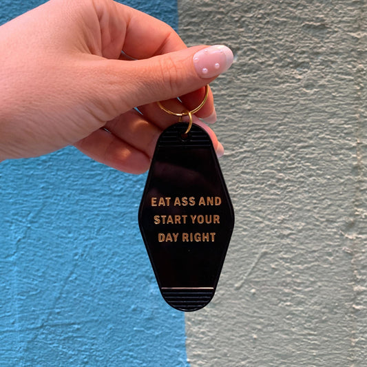 Eat Ass and Start Your Day Right Motel Style Keychain in Black and Gold