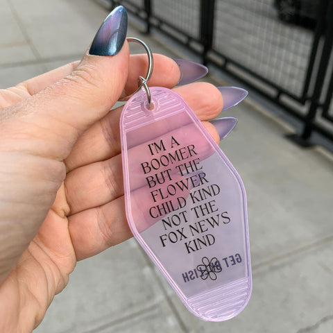 I’m a Boomer But Not the Fox News Kind Motel Style Keychain in Translucent Pink